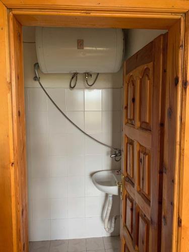 a bathroom with a sink and a toilet at Hotel Grabova in Grabova e Sipërme