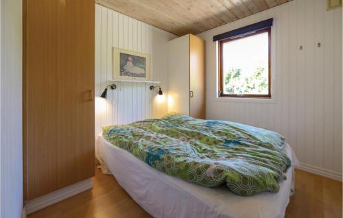 Postel nebo postele na pokoji v ubytování 5 Bedroom Pet Friendly Home In Vggerlse