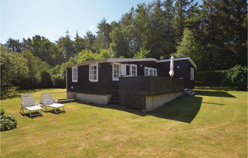 Κήπος έξω από το Two-Bedroom Holiday Home In Balle