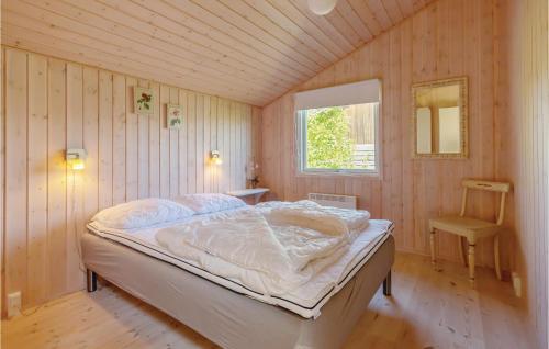 En eller flere senge i et værelse på Beautiful Home In Grlev With Kitchen