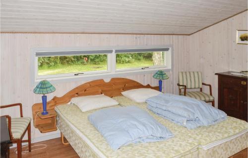 Ένα ή περισσότερα κρεβάτια σε δωμάτιο στο Lovely Home In Jerup With Wifi