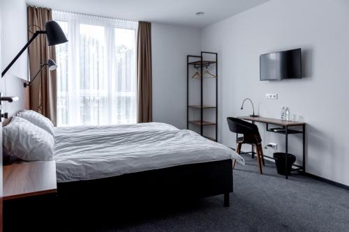Una cama o camas en una habitación de Muontis