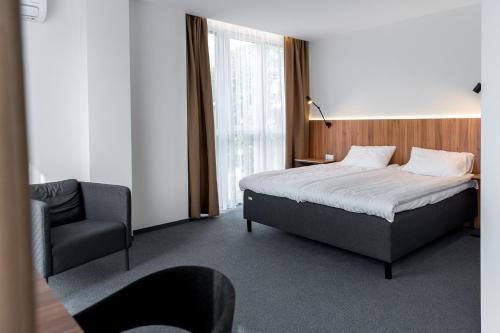 Una cama o camas en una habitación de Muontis