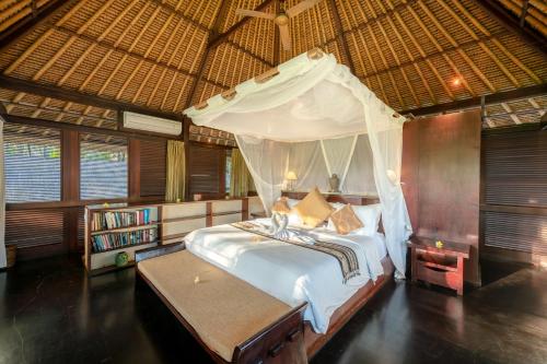 Katil atau katil-katil dalam bilik di Villa Pantulan Bali