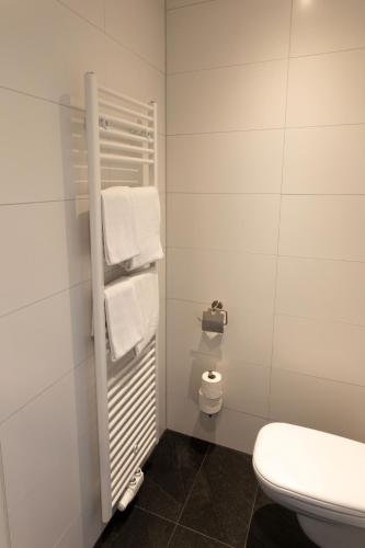 Un baño de TT-ROOMS - kontaktlos mit Self Check-in I FREE PARKING