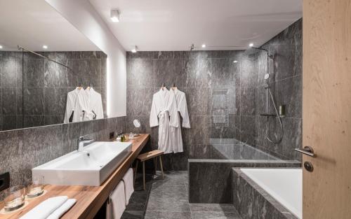 Koupelna v ubytování Vinea - Suites