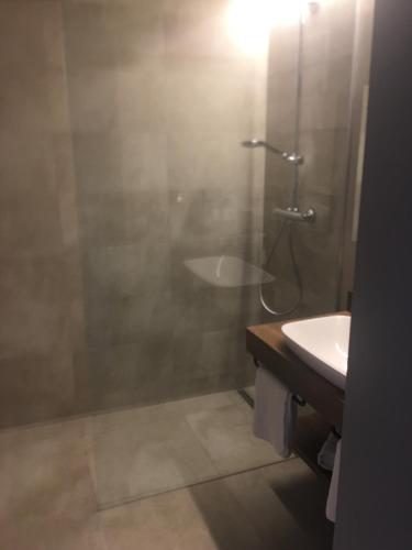 a bathroom with a shower and a sink at LakeSide Apartments Seefeld in Seefeld in Tirol