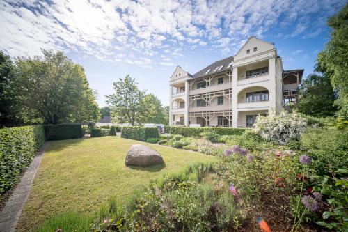 Κήπος έξω από το Hotel Villa Halliger