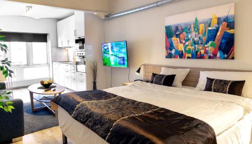 Ein Bett oder Betten in einem Zimmer der Unterkunft City HotelApartment