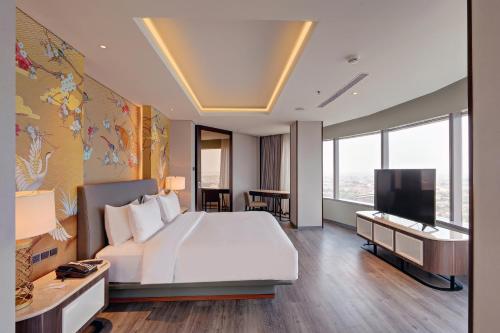 Μια τηλεόραση ή/και κέντρο ψυχαγωγίας στο Mercure Jakarta Gatot Subroto