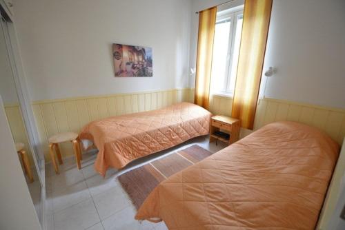 Postel nebo postele na pokoji v ubytování Lumostar