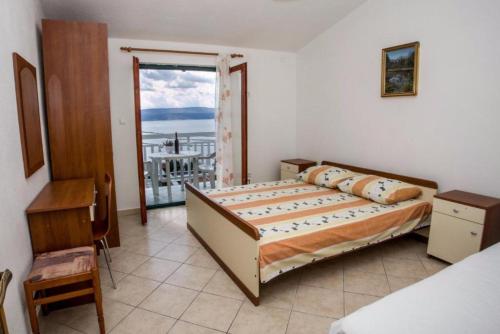 Postel nebo postele na pokoji v ubytování Apartment Vice