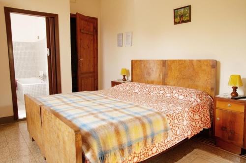 Una cama o camas en una habitación de Albergo Ristorante Guidi