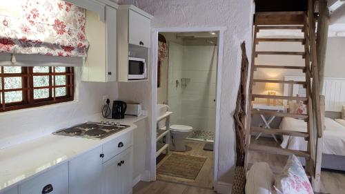Una cama o camas en una habitación de Avoca River Cabins
