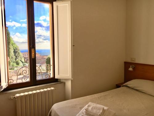 Katil atau katil-katil dalam bilik di Casa Mater Ecclesiae
