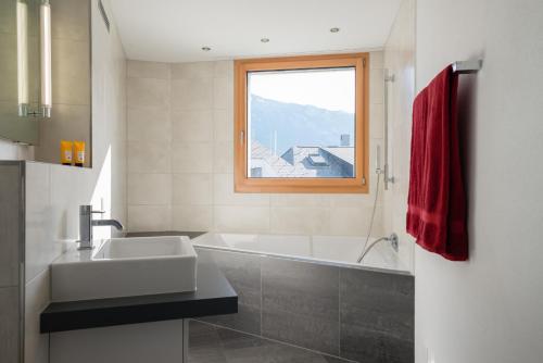 Ένα μπάνιο στο LAAX Homes Prada Biala