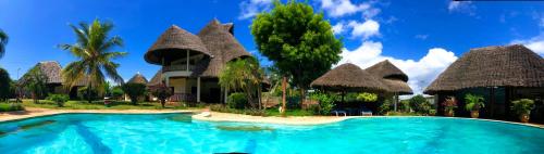 Πισίνα στο ή κοντά στο Diani-Paradise-Villas