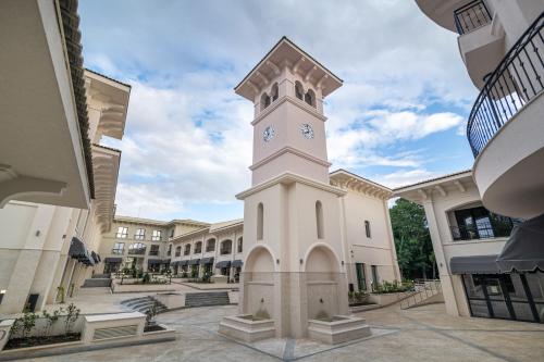 a clock tower in the middle of a building at Primorski Hotel in St. St. Constantine and Helena
