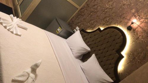 Cama o camas de una habitación en Heritage Hostel Cairo