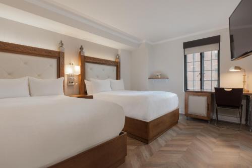 Ένα ή περισσότερα κρεβάτια σε δωμάτιο στο Westgate New York Grand Central