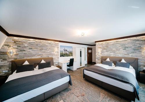 Postel nebo postele na pokoji v ubytování Central City Hotel