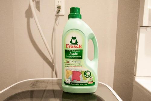 a bottle of fresh laundry detergent sitting on top of a sink at UCHI Living Stay TOYOHIRA in Sapporo