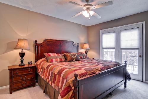 a bedroom with a bed and a ceiling fan at Oaks at Wasatch #7 in Cottonwood Heights