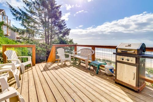 a wooden deck with chairs and a grill on it at Berni's Ocean View Castle - an Oceanside Legend in Oceanside