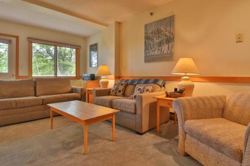 a living room with couches and a table at Locke Mountain A6 in Newry