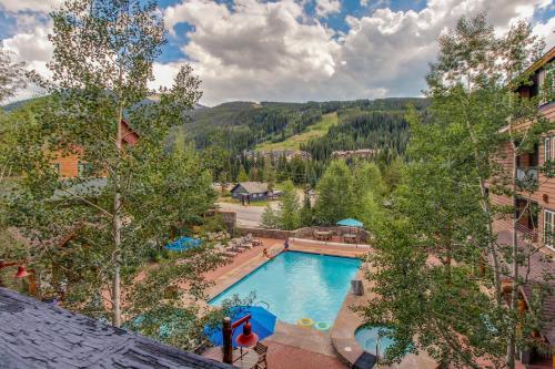 an overhead view of a swimming pool at a resort at The Dakota Outpost in Keystone