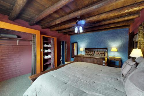 a bedroom with a large bed in a room at The Trading Post in Moab