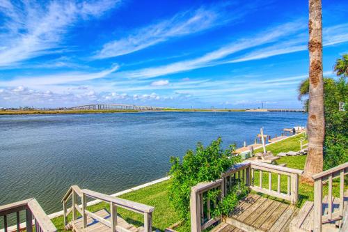 a view of the water with a bridge in the background at Puente Vista 119 in Padre Island