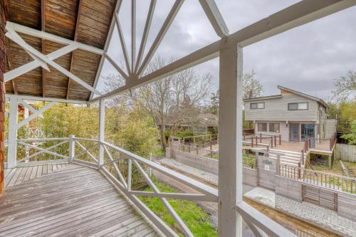 a view from the porch of a house with a deck at 195 Wilmot Road in Ocean Beach