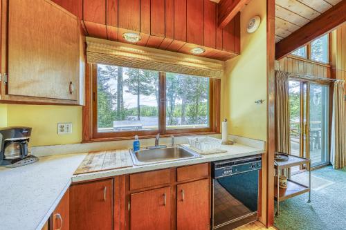 a kitchen with a sink and a window at Private Contemporary in Chestertown