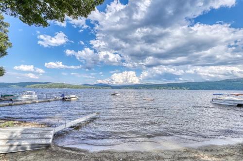 a view of a lake with boats in the water at Contemporary ADK 5 Bedroom Chalet on Schroon in Schroon Lake