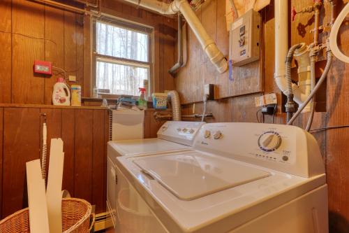 a laundry room with a sink and a washing machine at 116 Red Ridge Lane in Conway