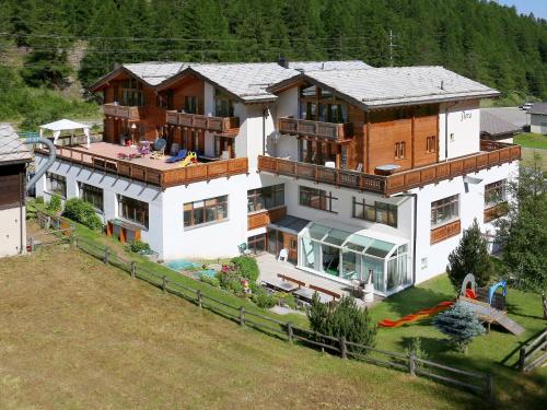an aerial view of a large house at Appartement Flora in Saas-Almagell