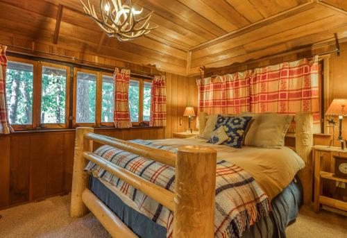 Voodi või voodid majutusasutuse Twin Tree Lodge toas