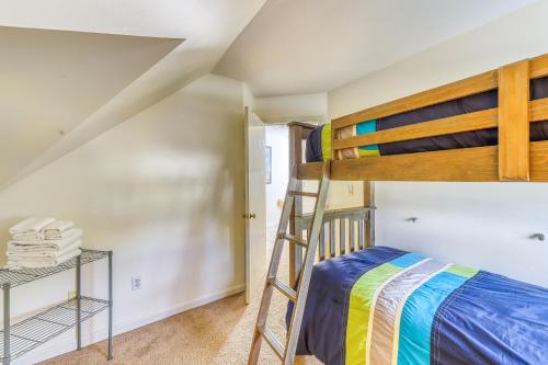 a bedroom with a bunk bed and a ladder at Cozy Stowe Retreat in Stowe