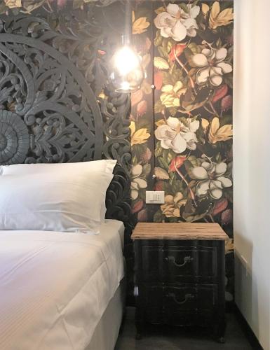 Letto o letti in una camera di Rigoletto Charm