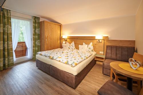 Postel nebo postele na pokoji v ubytování Haus Alpenheim