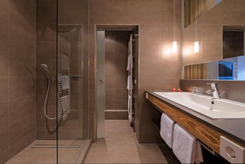 
A bathroom at Alemannenhof - Boutique Hotel am Titisee
