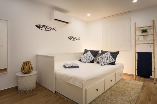 Tempat tidur dalam kamar di Lisbon Zoo House II