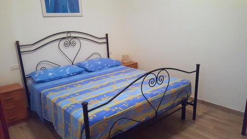 Postel nebo postele na pokoji v ubytování Casa di Irene