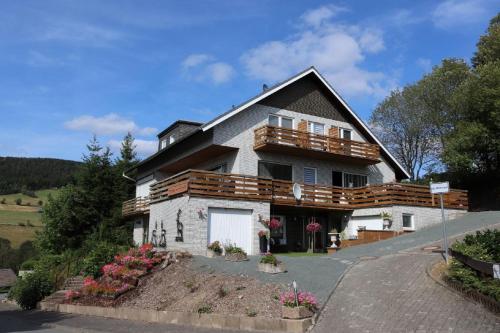 a house with a balcony on the side of it at Gretel von Birne in Winterberg
