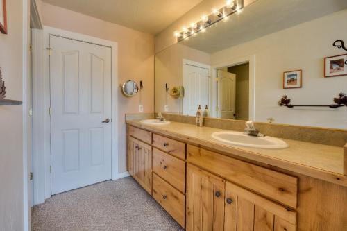 a bathroom with a sink and a mirror at Rim Village I4 in Moab