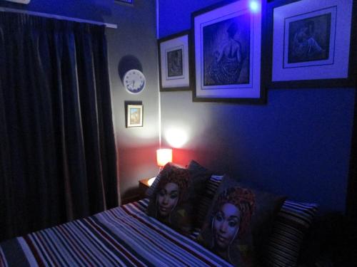 מיטה או מיטות בחדר ב-Moeg Geploeg Lodge