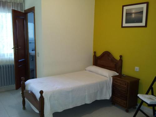 Posteľ alebo postele v izbe v ubytovaní Hostal Atila