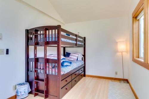 a bunk bed in a room with a bed at Cliffside Serenity in Oceanside