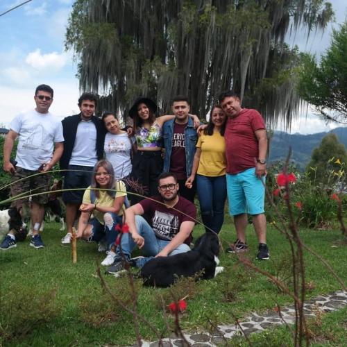 a group of people posing for a picture at Buriti EcoH RNT56521, via Termales Santa Rosa de Cabal in Santa Rosa de Cabal